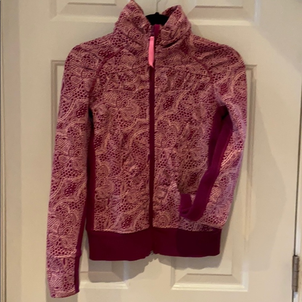 Ivivva light weight zip up jacket.